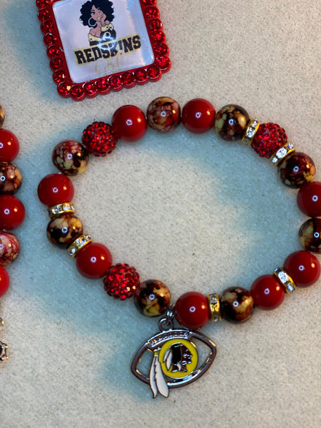 A Set of Redskins beaded bracelets